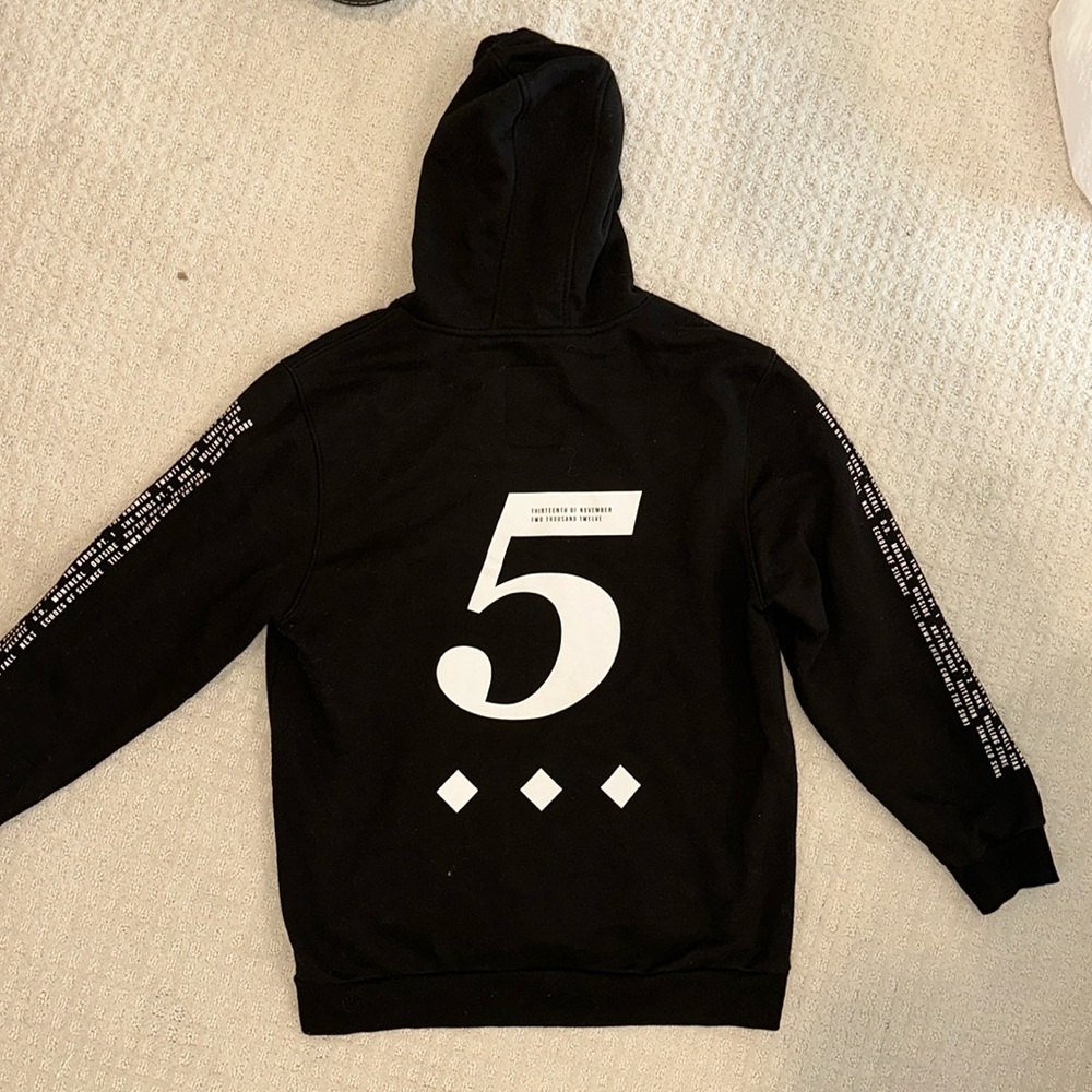 XL hoodie by The Weeknd featuring track list for “House of Balloons” on sleeves